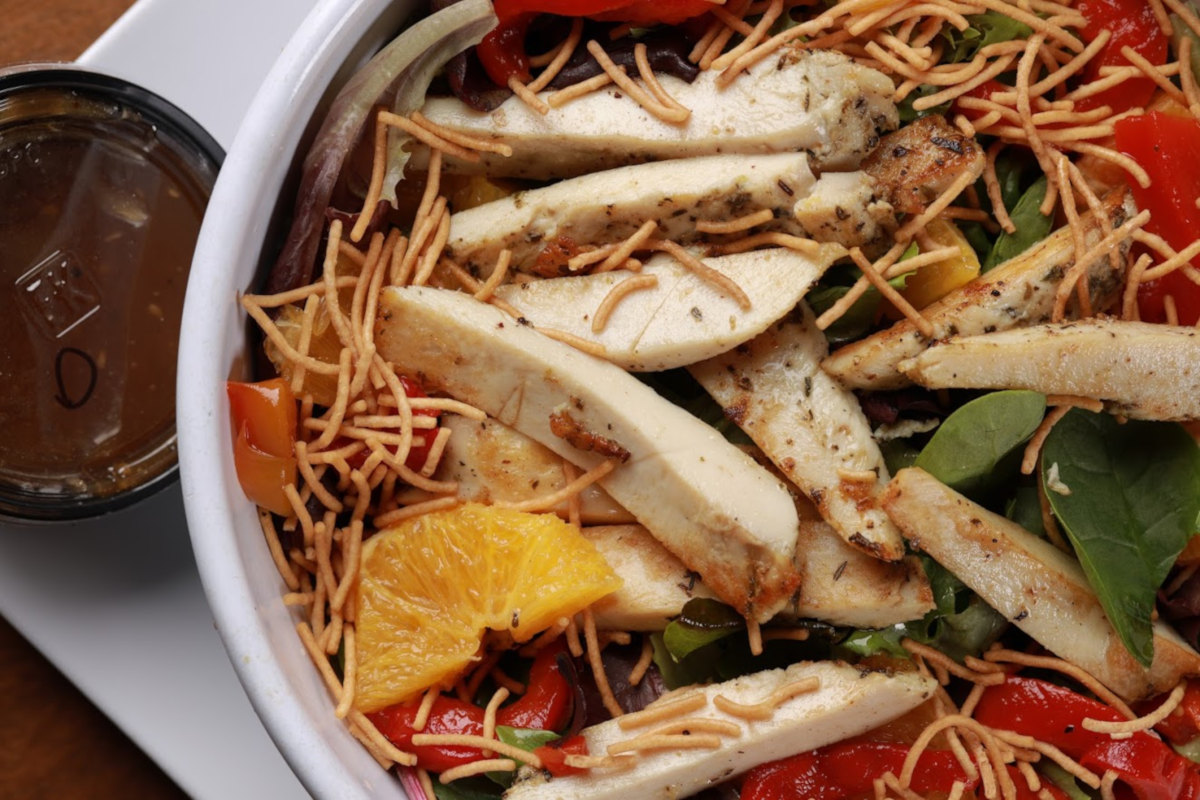 Colorful fruit and vegetables salad closeup